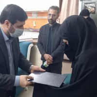 دیدار مسئولان وزارت بهداشت از خانواده شهید حسین زینال زاده